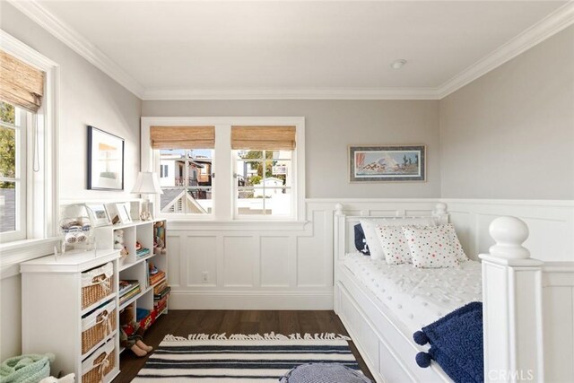 326 Ruby St, Laguna Beach, CA 92651 - bedroom featuring dark wood finished floors, crown molding, multiple windows, a wainscoted wall, and a decorative wall