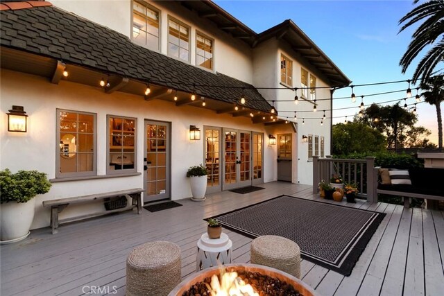 326 Ruby St, Laguna Beach, CA 92651 - wooden terrace with french doors and an outdoor fire pit