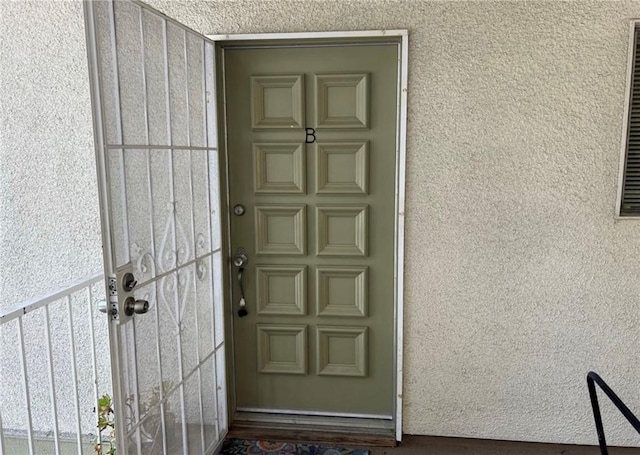 893 Ronda Sevilla Unit B, Laguna Woods, CA 92637 - property entrance with stucco siding