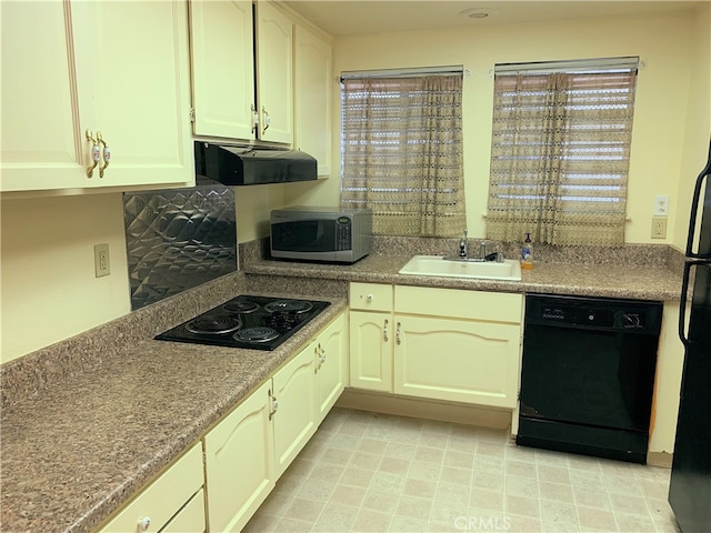 893 Ronda Sevilla Unit B, Laguna Woods, CA 92637 - kitchen featuring black appliances, range hood, and a sink