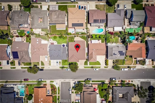16292 Wishingwell, Huntington Beach, CA 92647 - aerial view of property's location with nearby suburban area and a pool area