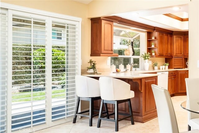 16292 Wishingwell, Huntington Beach, CA 92647 - bar featuring white dishwasher and light tile patterned flooring