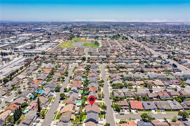 16292 Wishingwell, Huntington Beach, CA 92647 - aerial view of property and surrounding area with nearby suburban area