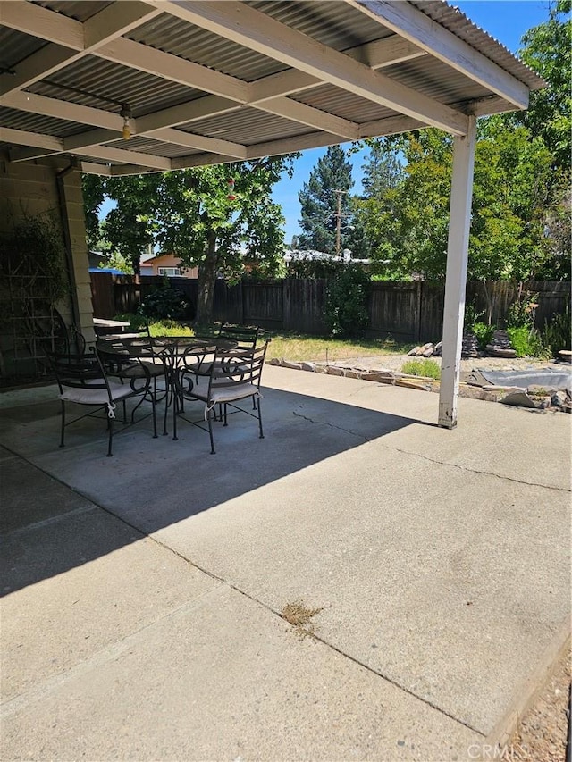 1371 Yokayo Dr, Ukiah, CA 95482 - fenced backyard featuring a patio area and outdoor dining area