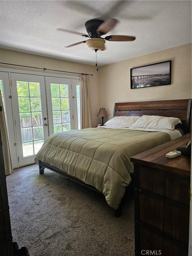 1371 Yokayo Dr, Ukiah, CA 95482 - bedroom with french doors, access to exterior, multiple windows, a textured ceiling, and carpet