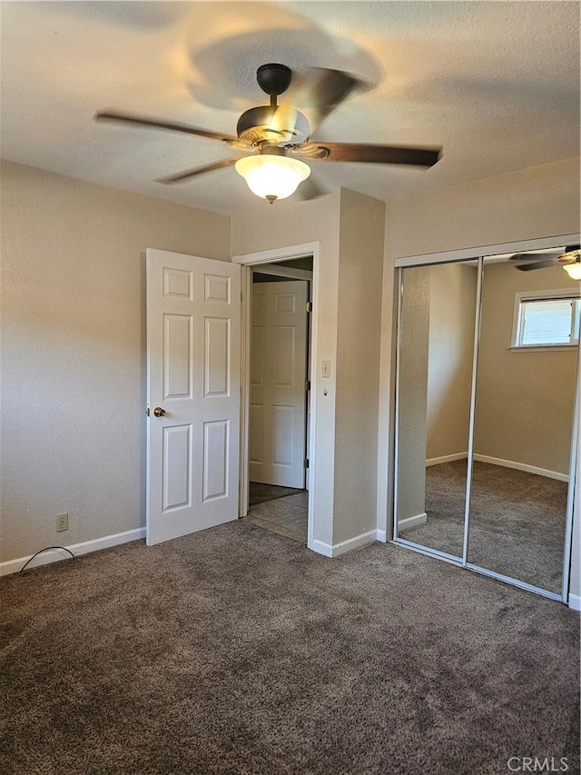1371 Yokayo Dr, Ukiah, CA 95482 - unfurnished bedroom with carpet floors, a closet, baseboards, and a ceiling fan