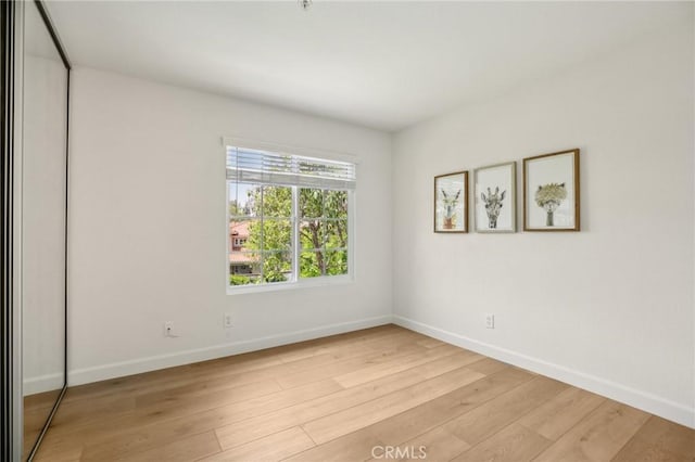 119 Gallery Way, Tustin, CA 92782 - empty room featuring light wood finished floors and baseboards