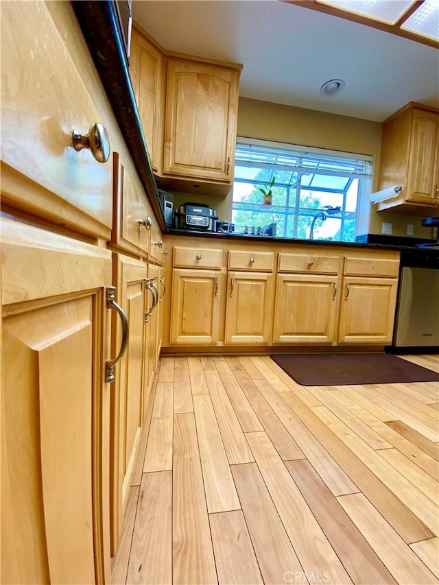 5218 Rocky Mountain Pl, Rancho Cucamonga, CA 91737 - kitchen with dishwasher, light brown cabinetry, light wood-type flooring, and dark countertops