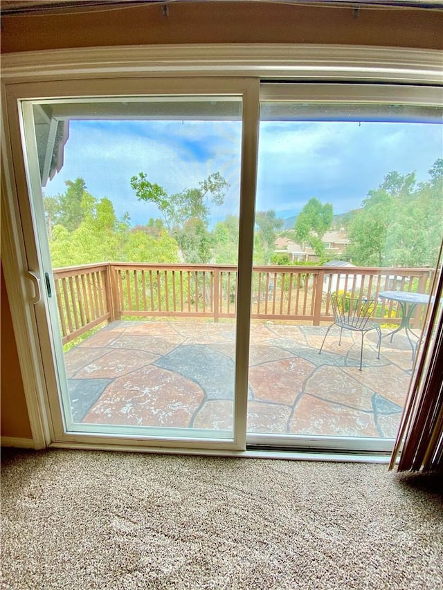 5218 Rocky Mountain Pl, Rancho Cucamonga, CA 91737 - doorway to outside featuring plenty of natural light and carpet