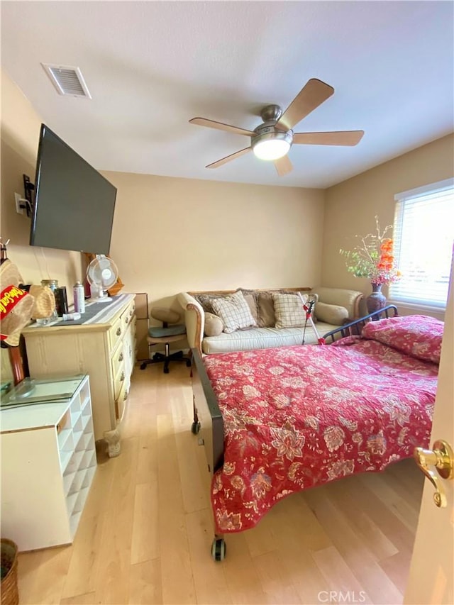 5218 Rocky Mountain Pl, Rancho Cucamonga, CA 91737 - bedroom with light wood finished floors and a ceiling fan