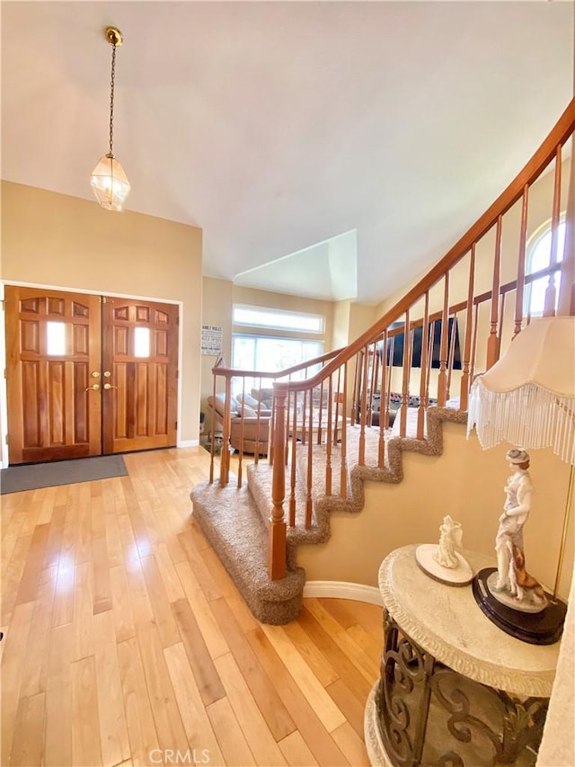5218 Rocky Mountain Pl, Rancho Cucamonga, CA 91737 - entryway featuring hardwood / wood-style flooring and stairs