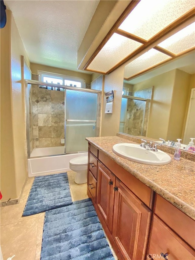 5218 Rocky Mountain Pl, Rancho Cucamonga, CA 91737 - full bathroom with shower / bath combination with glass door, vanity, and tile patterned floors