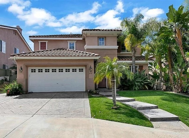 858 Via Barquero, San Marcos, CA 92069 - mediterranean / spanish house with stucco siding, driveway, a tiled roof, and a front yard