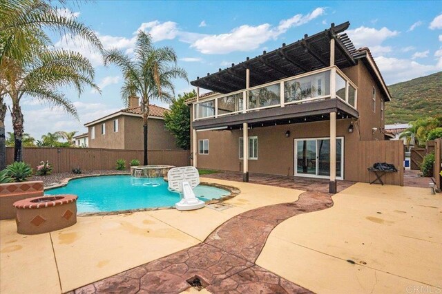 858 Via Barquero, San Marcos, CA 92069 - view of pool with an outdoor hot tub, a fenced backyard, and a patio area