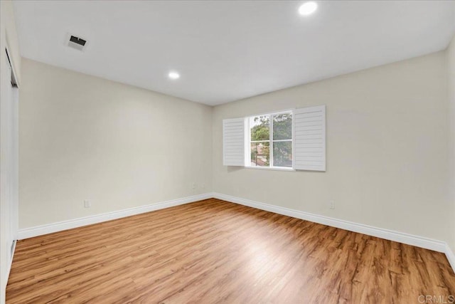 858 Via Barquero, San Marcos, CA 92069 - spare room with light wood-style floors, baseboards, and recessed lighting