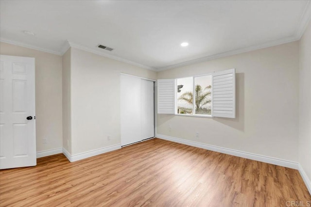 858 Via Barquero, San Marcos, CA 92069 - unfurnished bedroom with light wood finished floors, baseboards, a closet, and ornamental molding