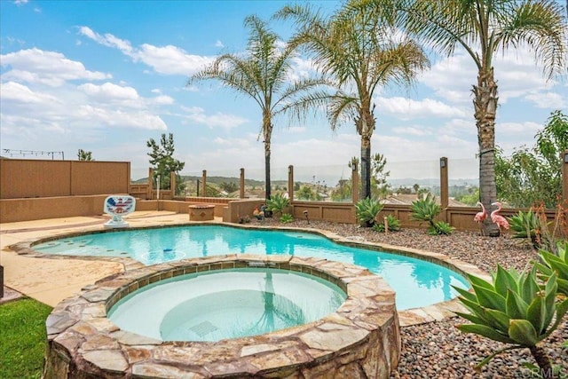 858 Via Barquero, San Marcos, CA 92069 - view of pool featuring a fenced backyard and a pool with connected hot tub