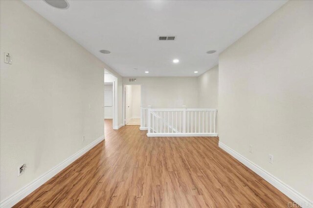 858 Via Barquero, San Marcos, CA 92069 - empty room with light wood-style floors and baseboards