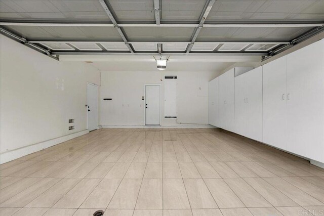 858 Via Barquero, San Marcos, CA 92069 - garage with a garage door opener