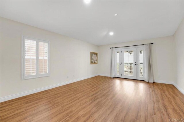 858 Via Barquero, San Marcos, CA 92069 - unfurnished room featuring light wood-style flooring, baseboards, french doors, and recessed lighting