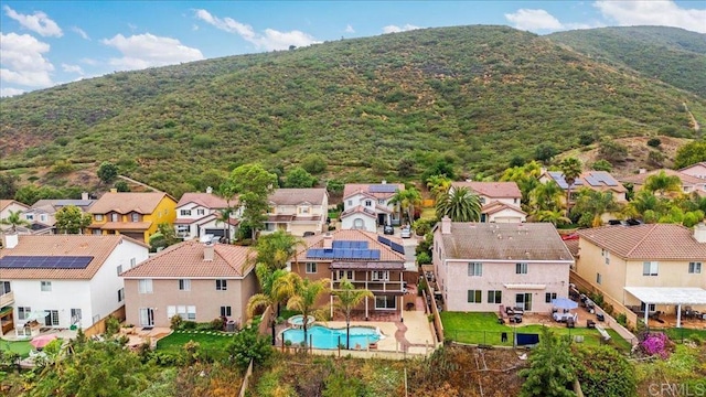 858 Via Barquero, San Marcos, CA 92069 - aerial perspective of suburban area featuring a pool area and a mountain backdrop