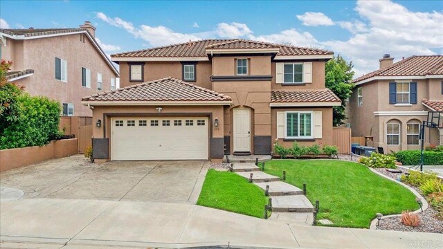 858 Via Barquero, San Marcos, CA 92069 - view of front of home with stucco siding, a tiled roof, an attached garage, and concrete driveway