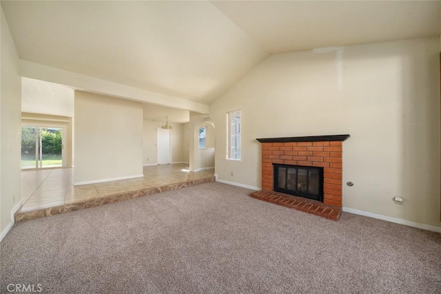 473 Hartnell Rd, Santa Maria, CA 93455 - unfurnished living room with carpet, a brick fireplace, baseboards, and high vaulted ceiling