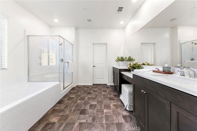 15975 Osprey Ave, Chino, CA 91708 - bathroom with a stall shower, vanity, a bath, plenty of natural light, and recessed lighting