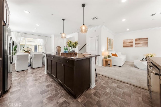 15975 Osprey Ave, Chino, CA 91708 - kitchen with open floor plan, ornamental molding, dark brown cabinetry, stainless steel fridge with ice dispenser, and dark stone counters
