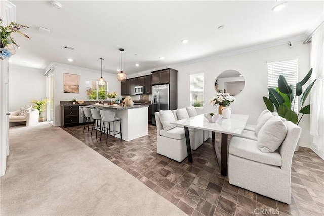 15975 Osprey Ave, Chino, CA 91708 - living area with healthy amount of natural light, ornamental molding, and recessed lighting