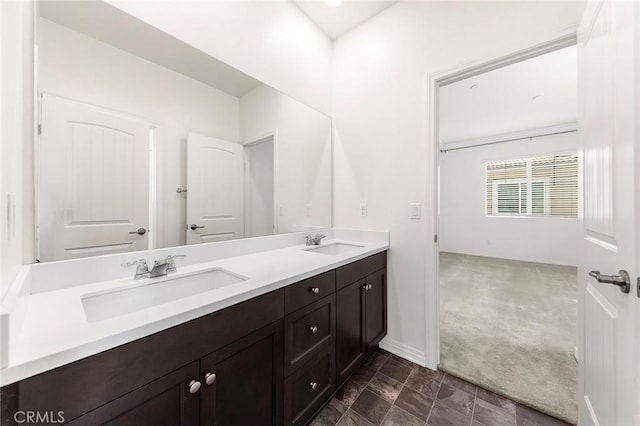 15975 Osprey Ave, Chino, CA 91708 - full bath with double vanity and baseboards