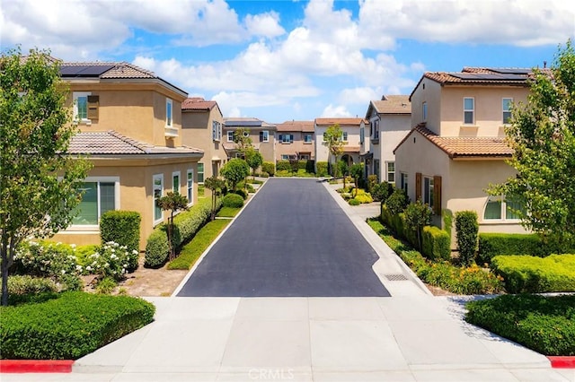 15975 Osprey Ave, Chino, CA 91708 - view of street featuring a residential view