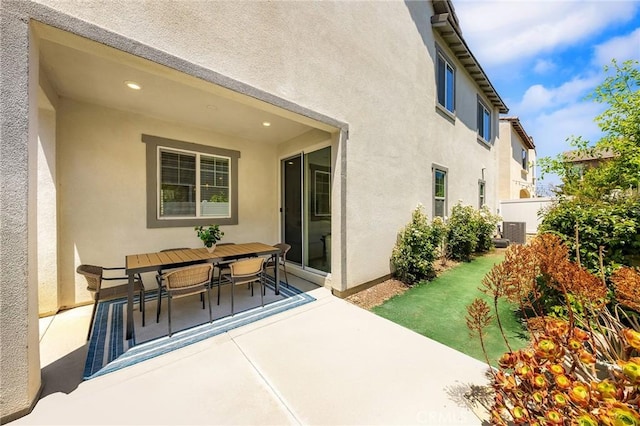 15975 Osprey Ave, Chino, CA 91708 - view of patio / terrace with outdoor dining space and central AC