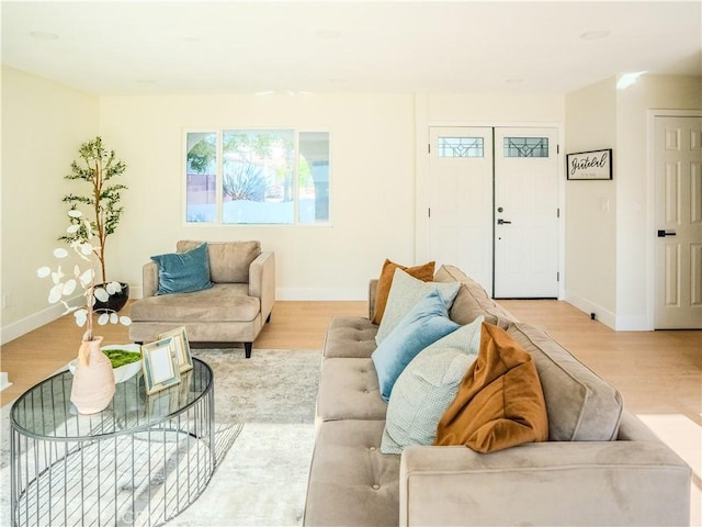 8213 Ethel Ave, North Hollywood, CA 91605 - living area featuring light wood-style flooring and baseboards