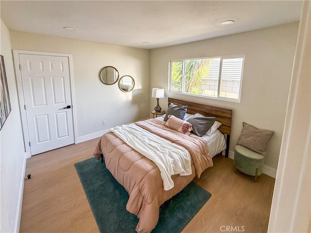 8213 Ethel Ave, North Hollywood, CA 91605 - bedroom featuring wood finished floors, baseboards, and recessed lighting