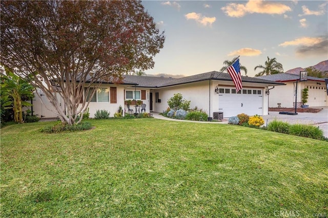 7680 Jadeite Ave, Rancho Cucamonga, CA 91730 - single story home featuring a garage, a lawn, driveway, and stucco siding