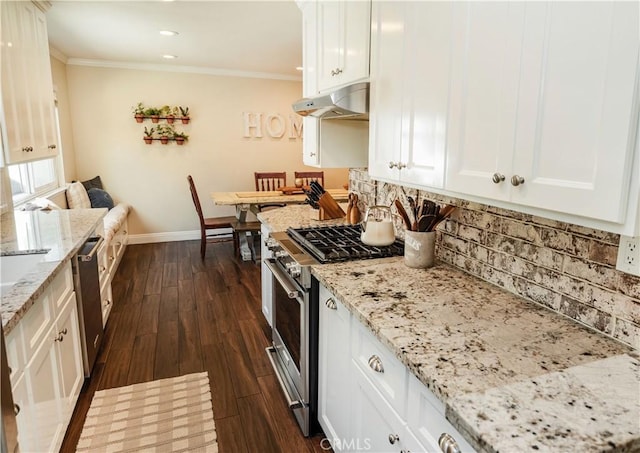 7680 Jadeite Ave, Rancho Cucamonga, CA 91730 - kitchen with appliances with stainless steel finishes, under cabinet range hood, baseboards, backsplash, and dark wood-style flooring