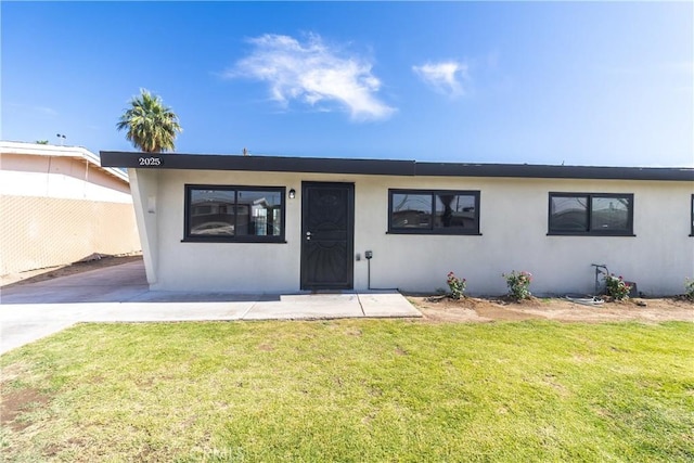 2025 Rio Vis, Needles, CA 92363 - view of front of home with a front yard and stucco siding