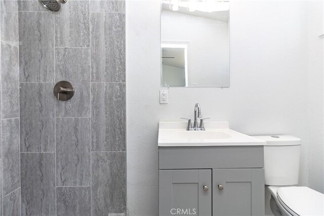 2025 Rio Vis, Needles, CA 92363 - bathroom with vanity, toilet, and tiled shower