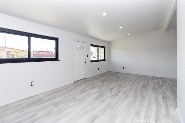 2025 Rio Vis, Needles, CA 92363 - unfurnished living room featuring light wood-style flooring and recessed lighting