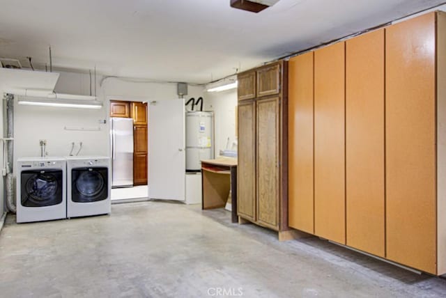 3375 Punta Alta Unit A, Laguna Woods, CA 92637 - garage featuring freestanding refrigerator, water heater, and separate washer and dryer
