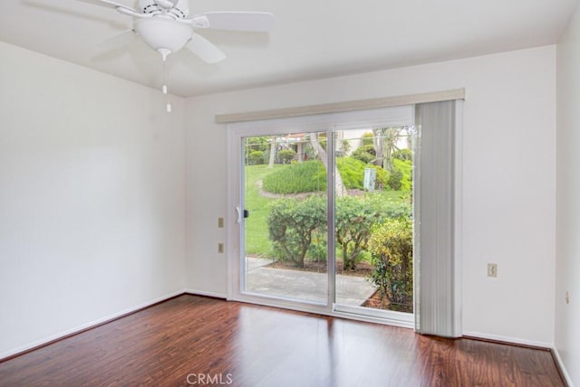 3375 Punta Alta Unit A, Laguna Woods, CA 92637 - spare room featuring wood finished floors, baseboards, and a ceiling fan