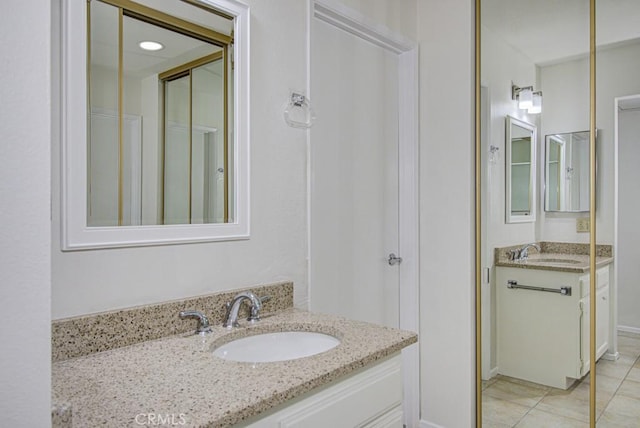3375 Punta Alta Unit A, Laguna Woods, CA 92637 - full bathroom featuring vanity and tile patterned flooring