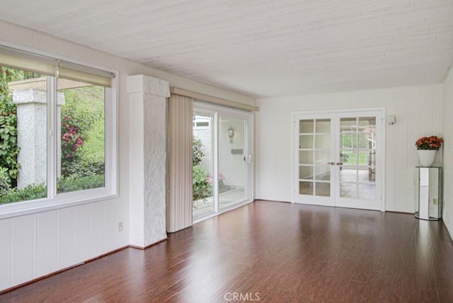 3375 Punta Alta Unit A, Laguna Woods, CA 92637 - unfurnished room featuring french doors, wood finished floors, wooden ceiling, and baseboards