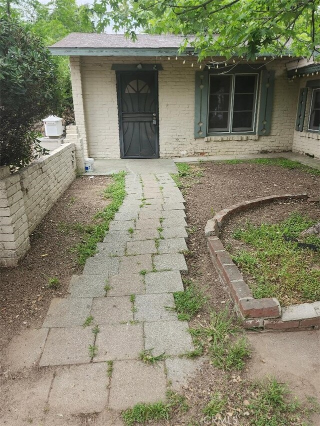 1280 E Woodbury Rd, Pasadena, CA 91104 - entrance to property featuring brick siding