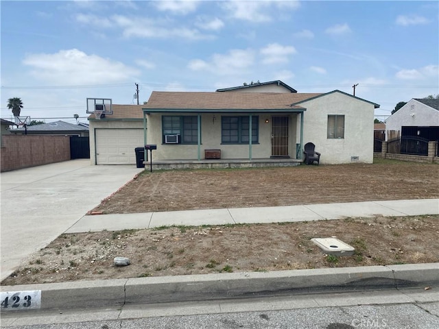 423 S Virginia Ave, Azusa, CA 91702 - single story home with an attached garage, covered porch, concrete driveway, stucco siding, and roof with shingles