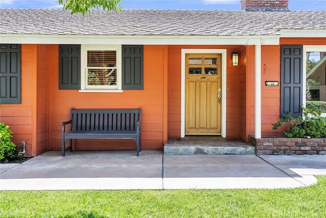 2886 Mcallister St, Riverside, CA 92503 - property entrance featuring a chimney and a shingled roof