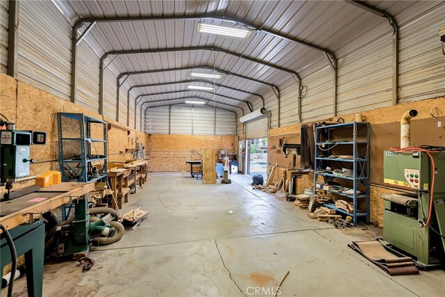 2886 Mcallister St, Riverside, CA 92503 - garage featuring a workshop area and metal wall