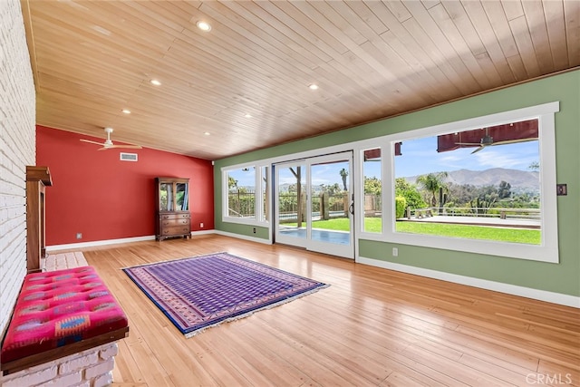 2886 Mcallister St, Riverside, CA 92503 - exercise area with wooden ceiling, vaulted ceiling, baseboards, a ceiling fan, and a mountain view
