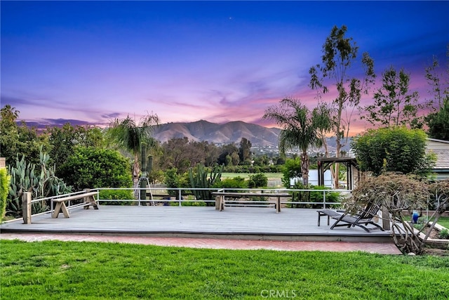 2886 Mcallister St, Riverside, CA 92503 - view of property's community with a deck with mountain view and a lawn
